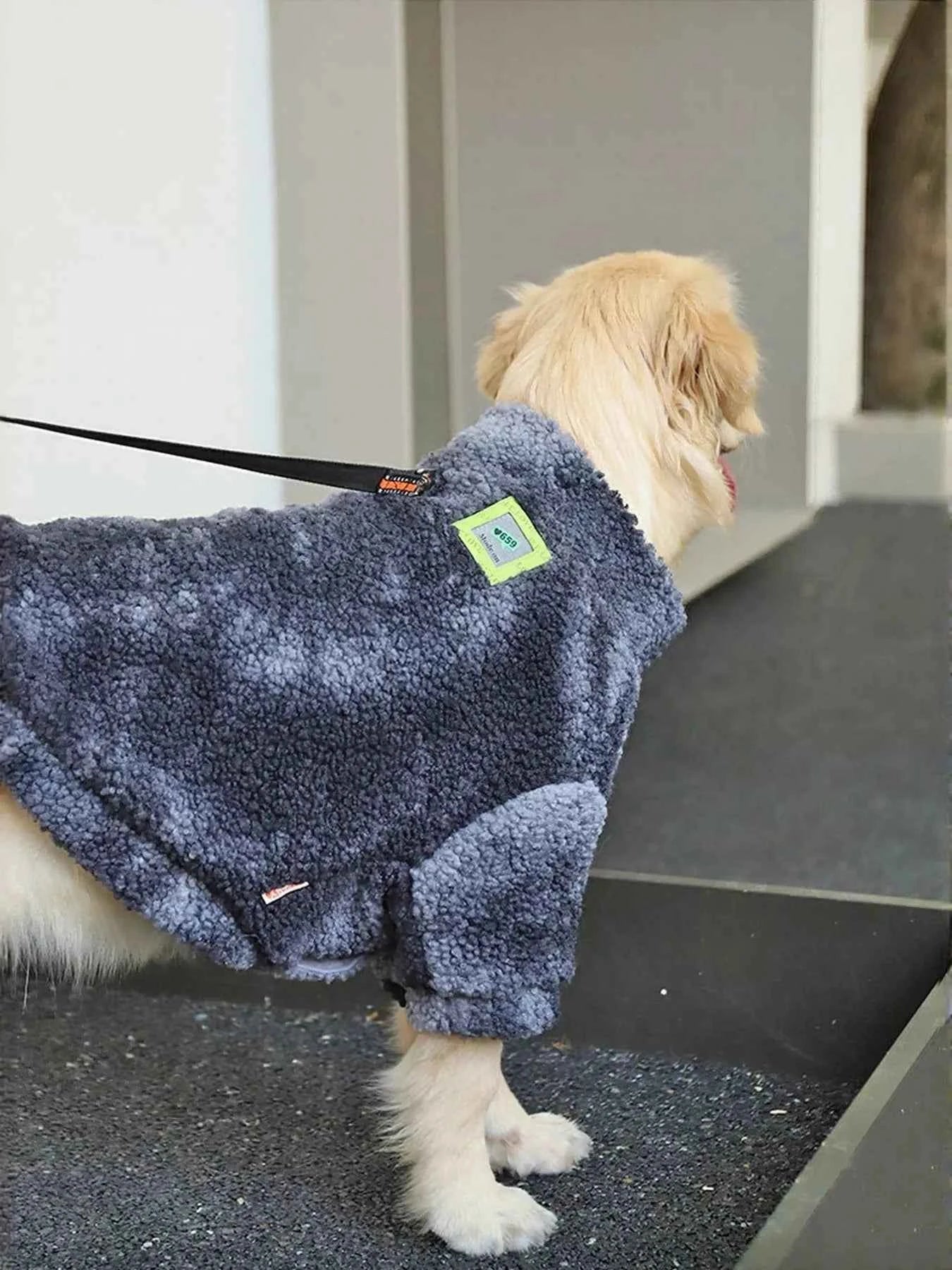 Black heavy-duty dog coat by All Sorts Co. provides premium protection and warmth for large furry dogs.