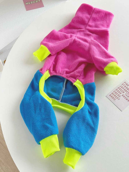 Hot pink outdoor dog jacket for large dogs by All Sorts Co. with durable material and adjustable fit.