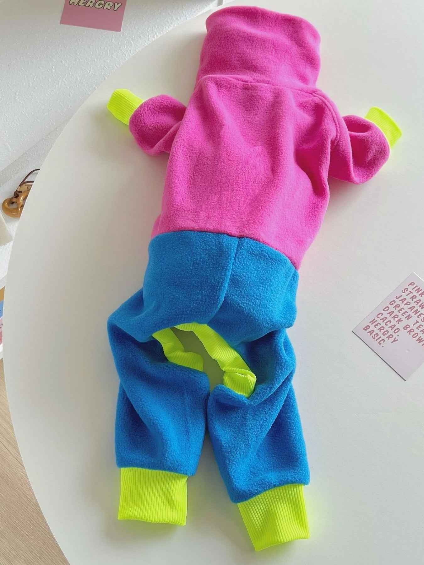 All Sorts Co. high-quality hot pink outdoor dog jacket for large dogs, weather-resistant dog clothing with adjustable straps.