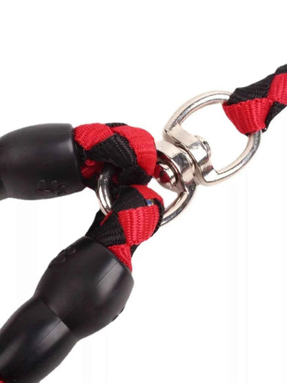 Black and red braided dog leash by All Sorts Co., comfortable, durable design for easy walks with your furry friend.