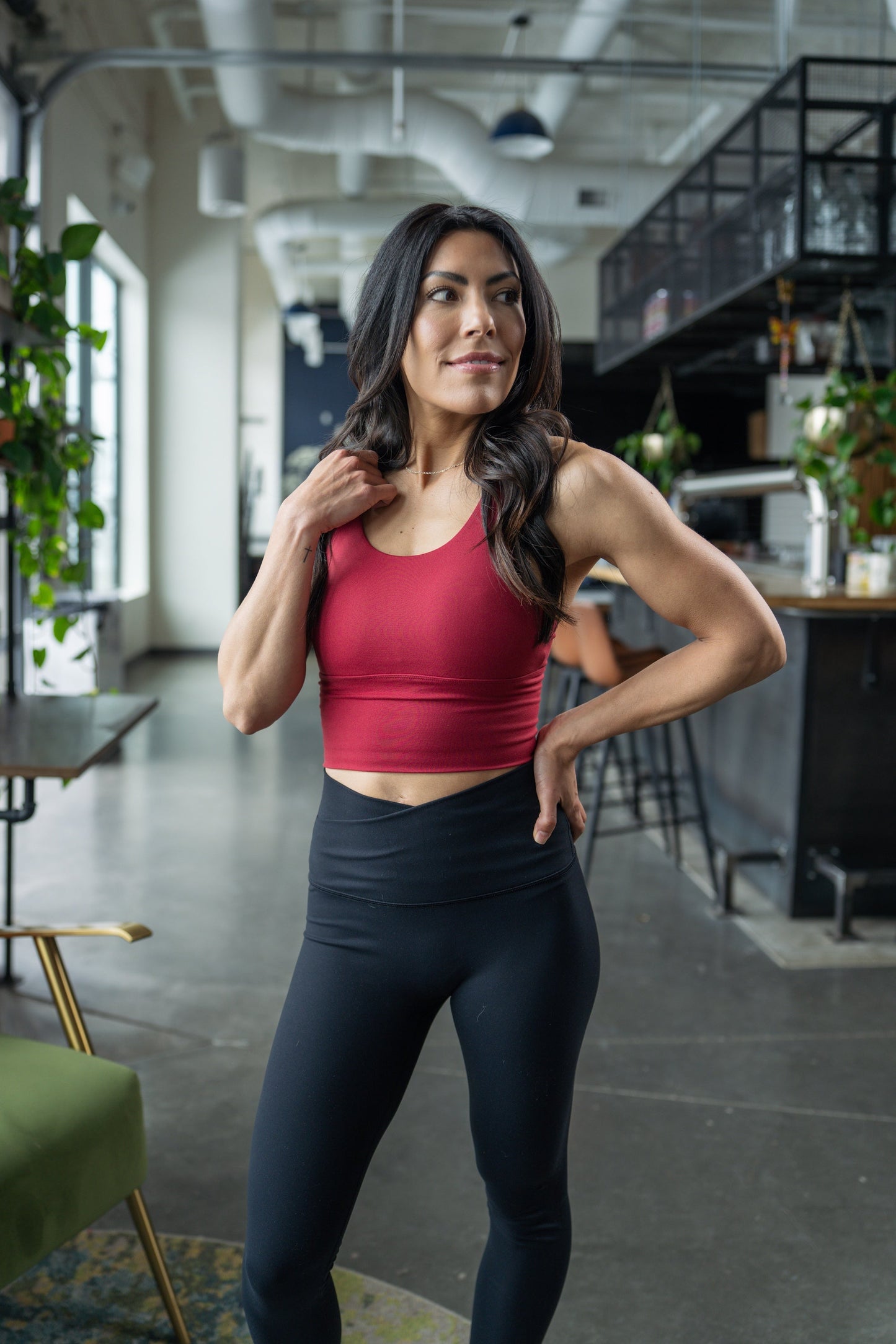 Black Alyth Active rebellious crop bra, X-small, shown on model highlighting its sporty fit and supportive design.