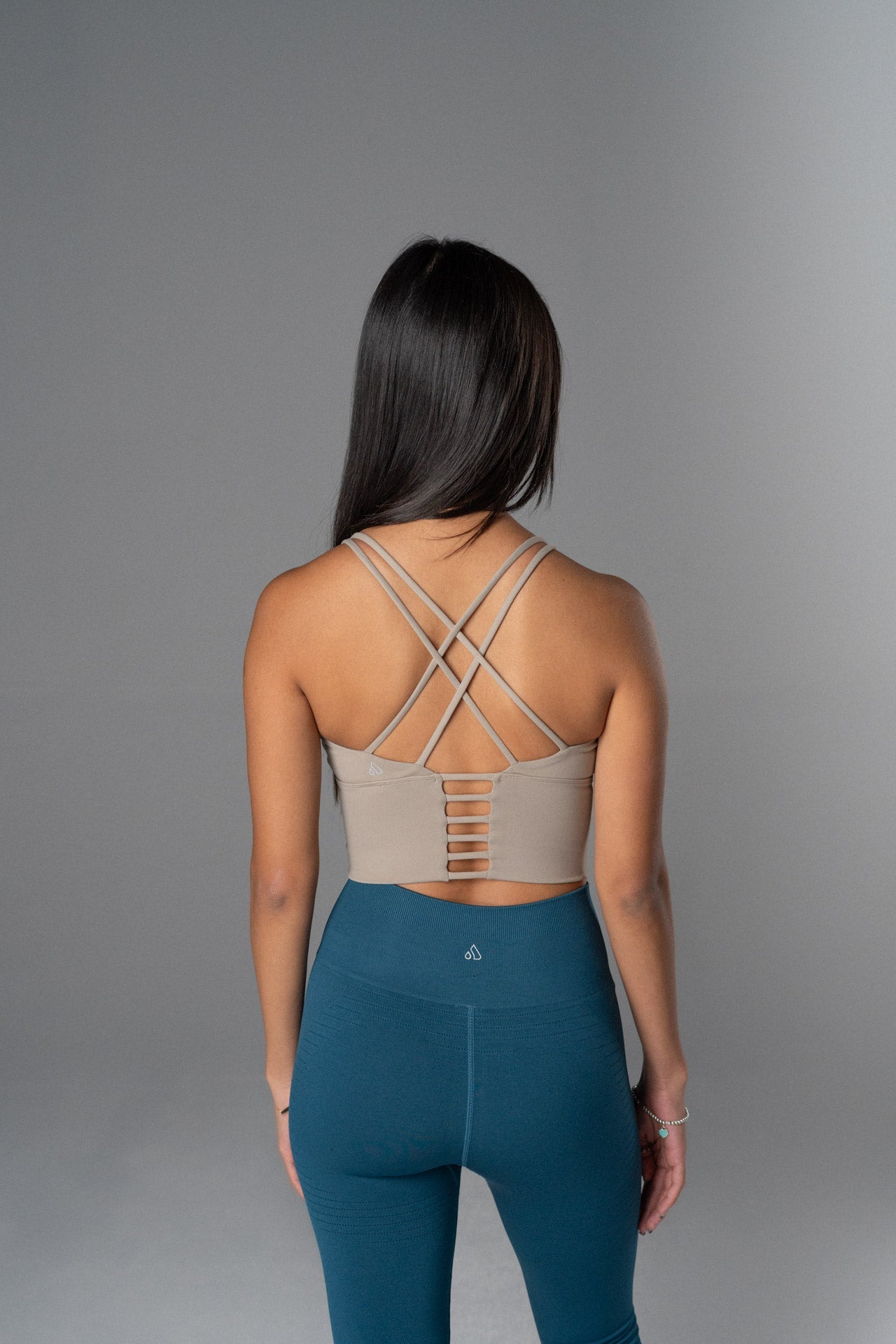 Black Alyth Active rebellious crop bra, small size, featuring a sleek design perfect for activewear and casual outfits.
