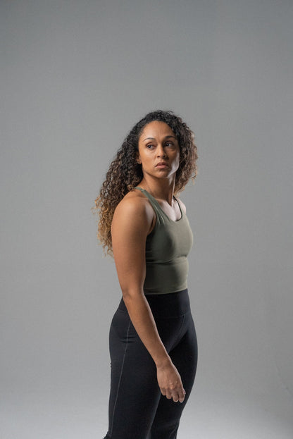 Black Alyth Active rebellious crop bra for women, showing the fitted, supportive design on a small size mannequin.