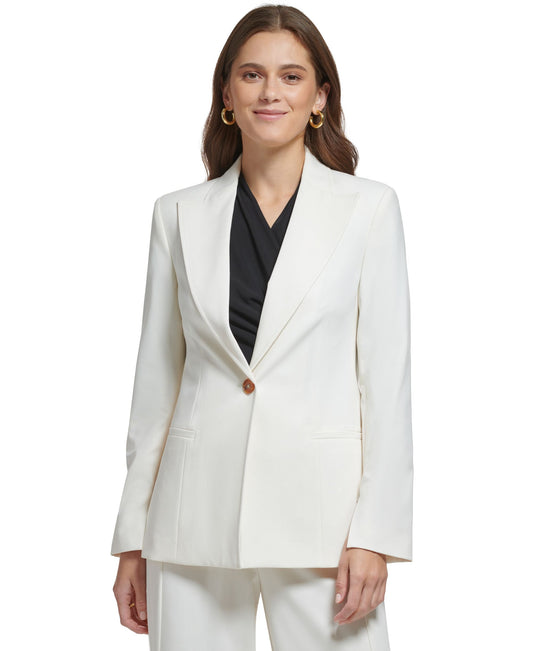 Beige DKNY women's long-sleeve blazer with peak collar and single button, stylish women's clothing by Amber Chrysippus.