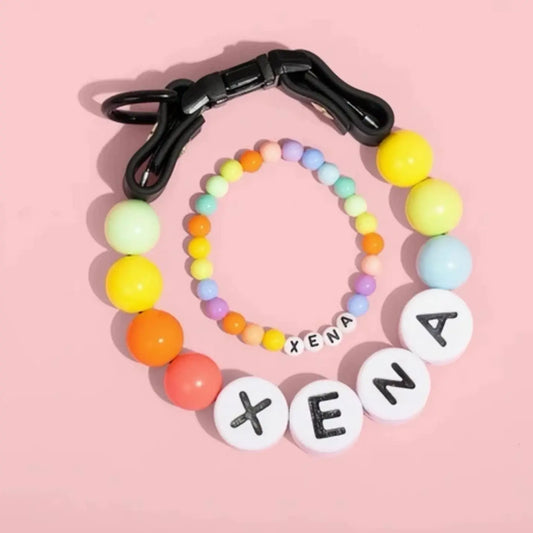 Personalized PawBond pet collar and matching bracelet set in color 18-21 inches, featuring paw print design and adjustable fit.