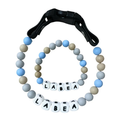 Personalized PawBond pet collar and matching bracelet set with paw print design, adjustable 18-21 inches, by AnHui GoodLuck.
