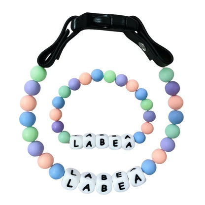 Personalized pet collar and matching bracelet set by PawBond™, featuring colorful adjustable design for pets and humans.