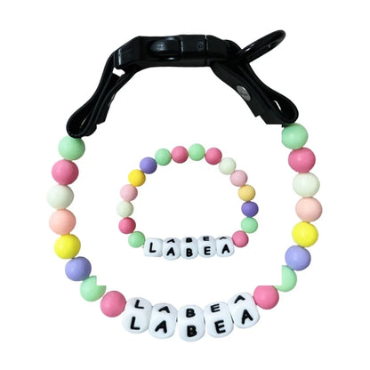 Personalized Pet Collar and Matching Bracelet Set from PawBond™ by AnHui GoodLuck, featuring colorful adjustable designs for pets and owners.