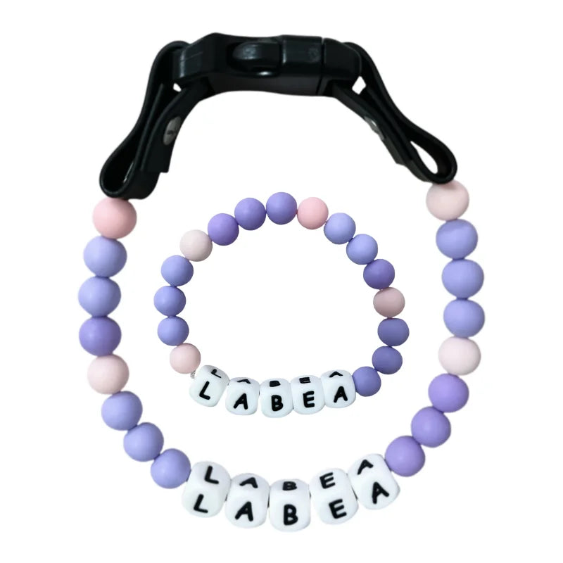 Personalized PawBond pet collar and matching bracelet set in 18-21 inches, featuring paw print design for pets and owners.