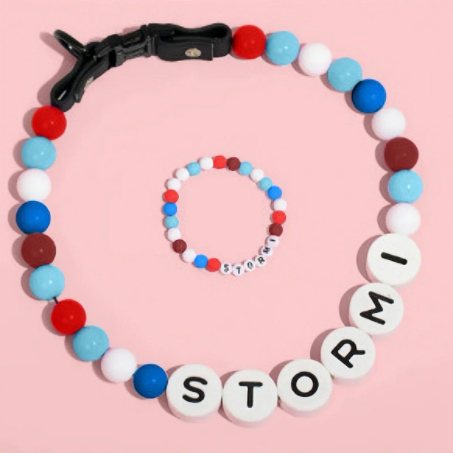 Personalized Pet Collar and Matching Bracelet Set by PawBond™ in vibrant colors, featuring paw print design for pets and accessories