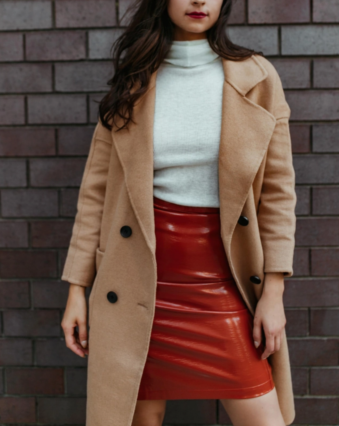 Orange vinyl skirt from Azure Thanatos Berlin Rock ‘n’ Roll collection, featuring a stylish and edgy design.