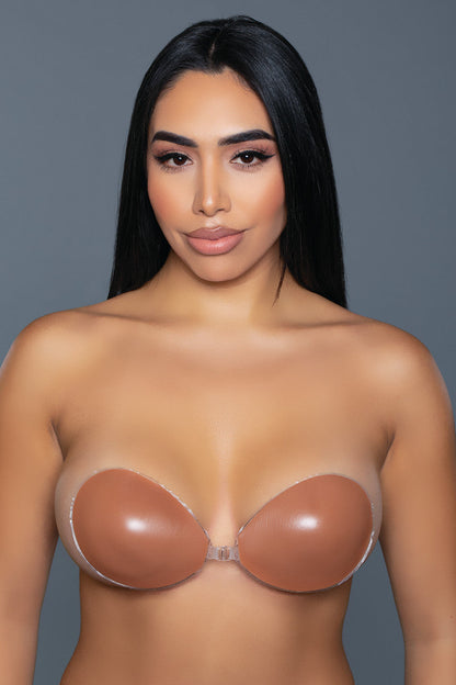 BeWicked nude strapless silicone adhesive bra with seamless design, providing support and invisibility under clothing.