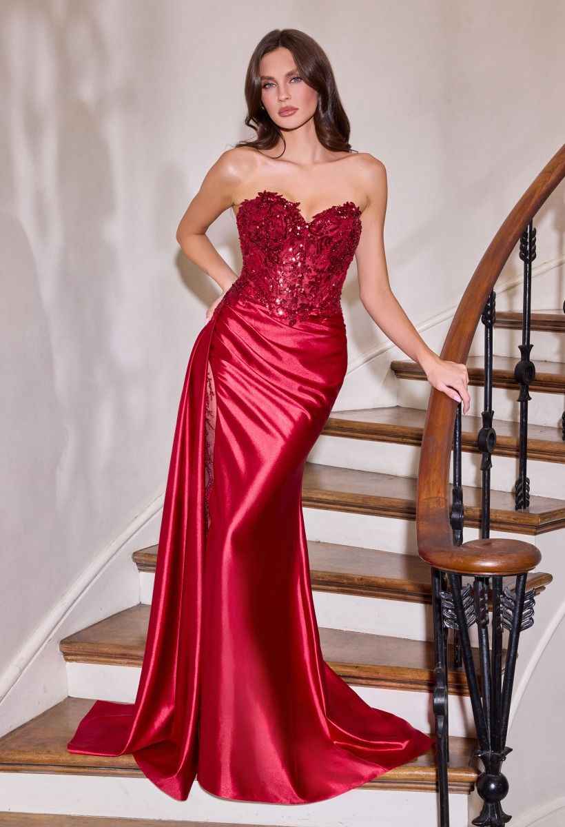 Black sequins embellished evening gown by CIND with corset bodice and side drape, perfect for graduation or formal events.