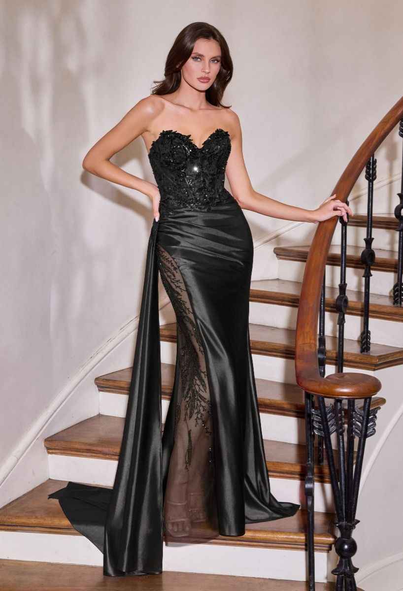 Black sequins embellished long evening gown by CIND with corset bodice and side drape for graduation or formal events.