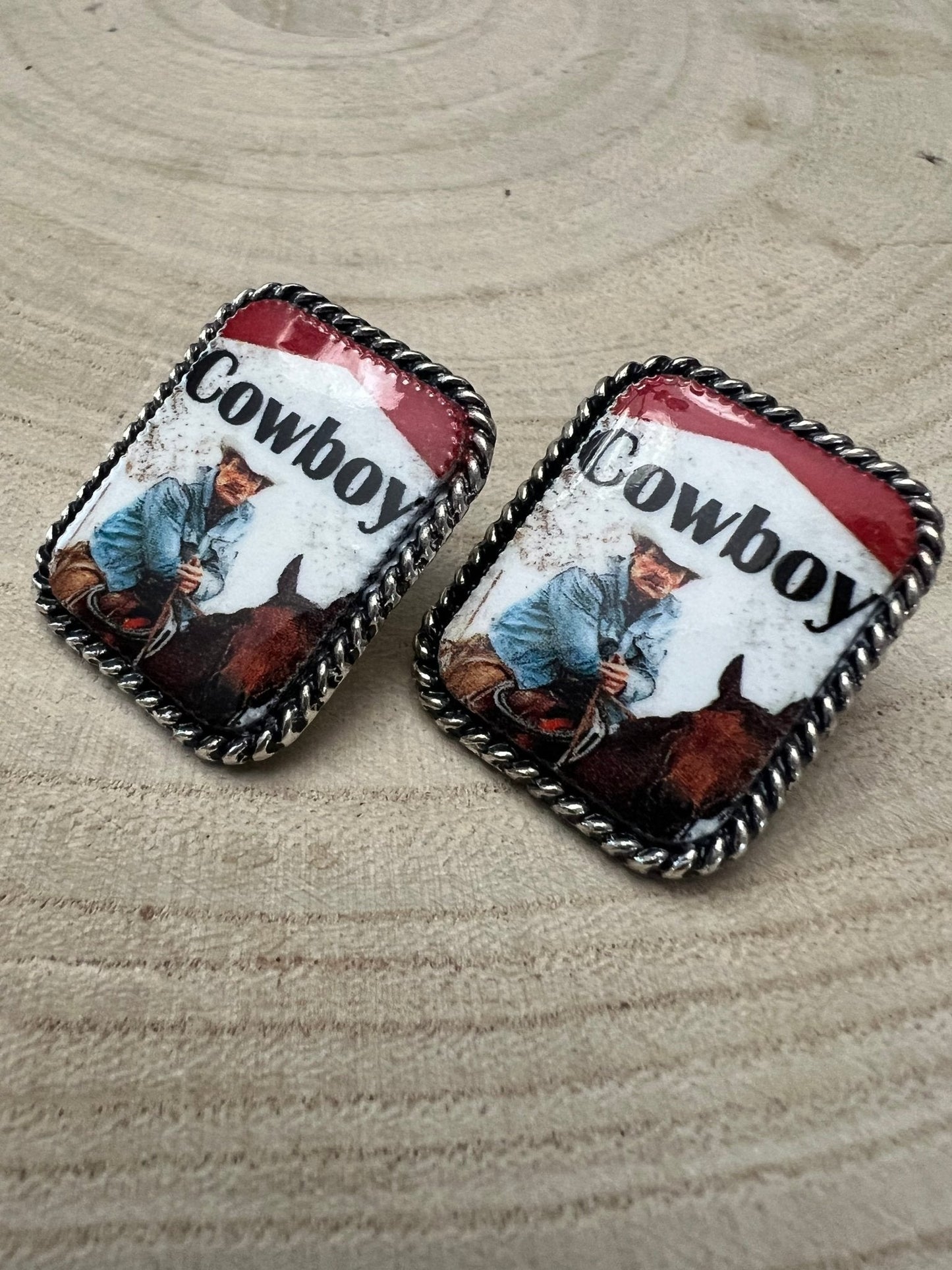 Western cowboy cigarette earrings by Cowhide and Conchos, petite 1-inch western statement fashion jewelry with cowhide and concho details.