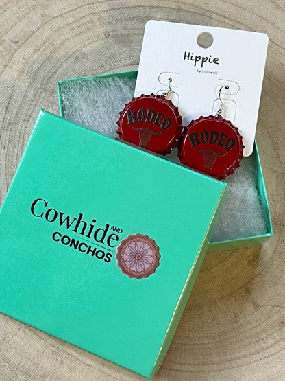 Western Rodeo Steer Head earrings by Cowhide and Conchos featuring bull motif, cowhide accents, and Western-inspired jewelry design.
