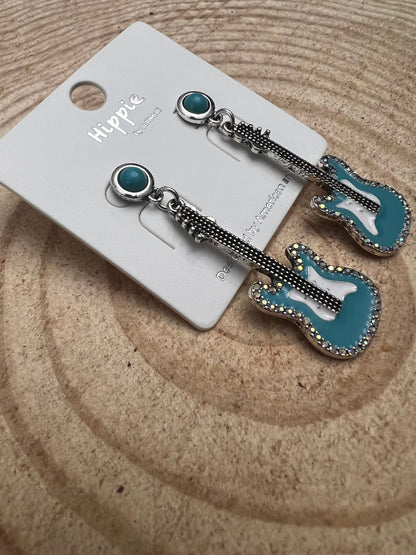 Western turquoise guitar dangle earrings by Cowhide and Conchos, country music-inspired fashion jewelry with 2-inch drop.