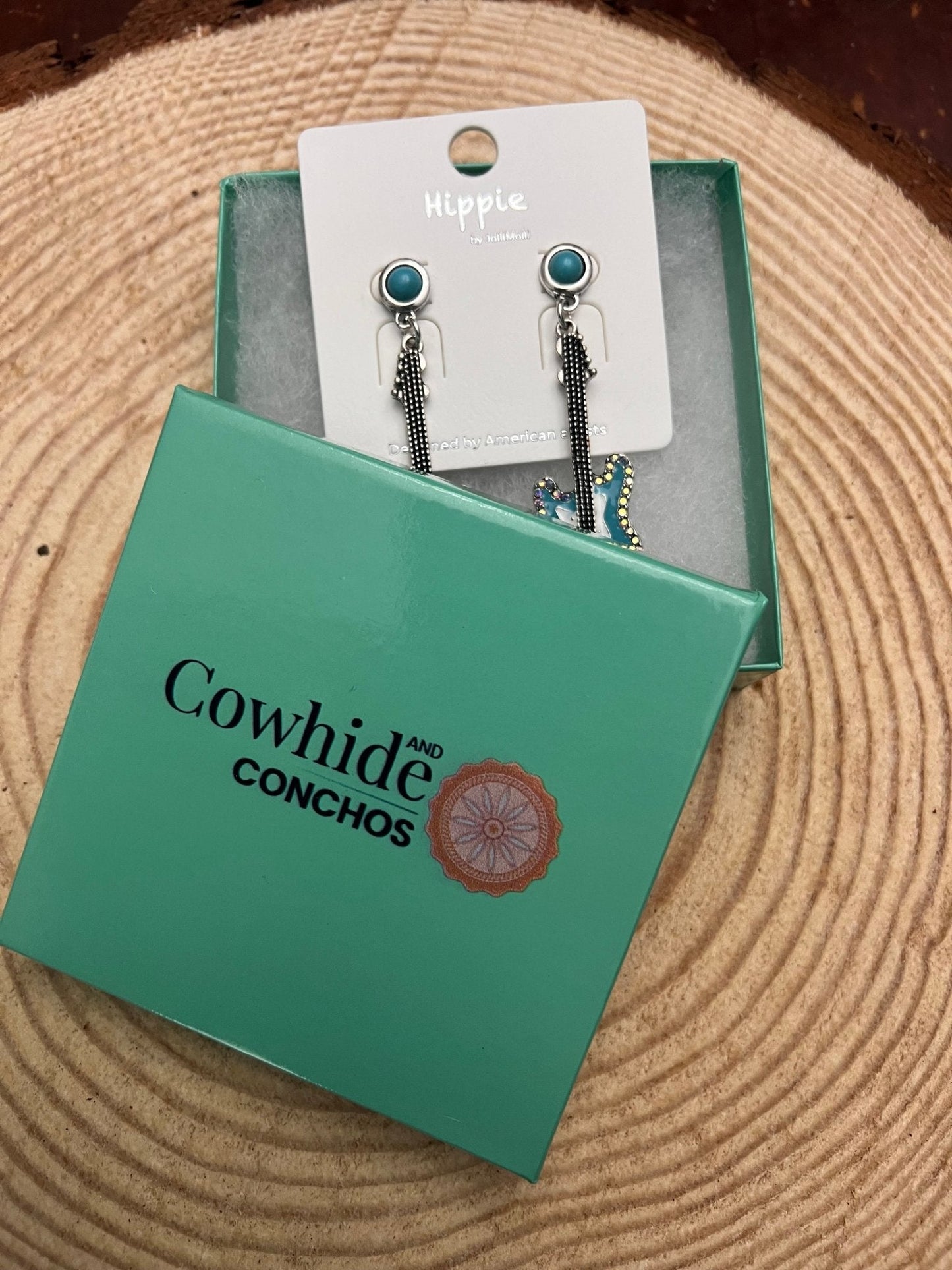 Western Turquoise Guitar Dangle Earrings by Cowhide and Conchos, 2-inch drop, featuring cowhide and country music-inspired design.