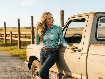 Cowhide and Conchos turquoise Aztec print long sleeve mesh Western top with bold Southwestern geometric design for women.