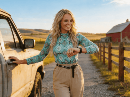 Women's turquoise Aztec print long sleeve mesh western top by Cowhide and Conchos with bold southwestern geometric design.