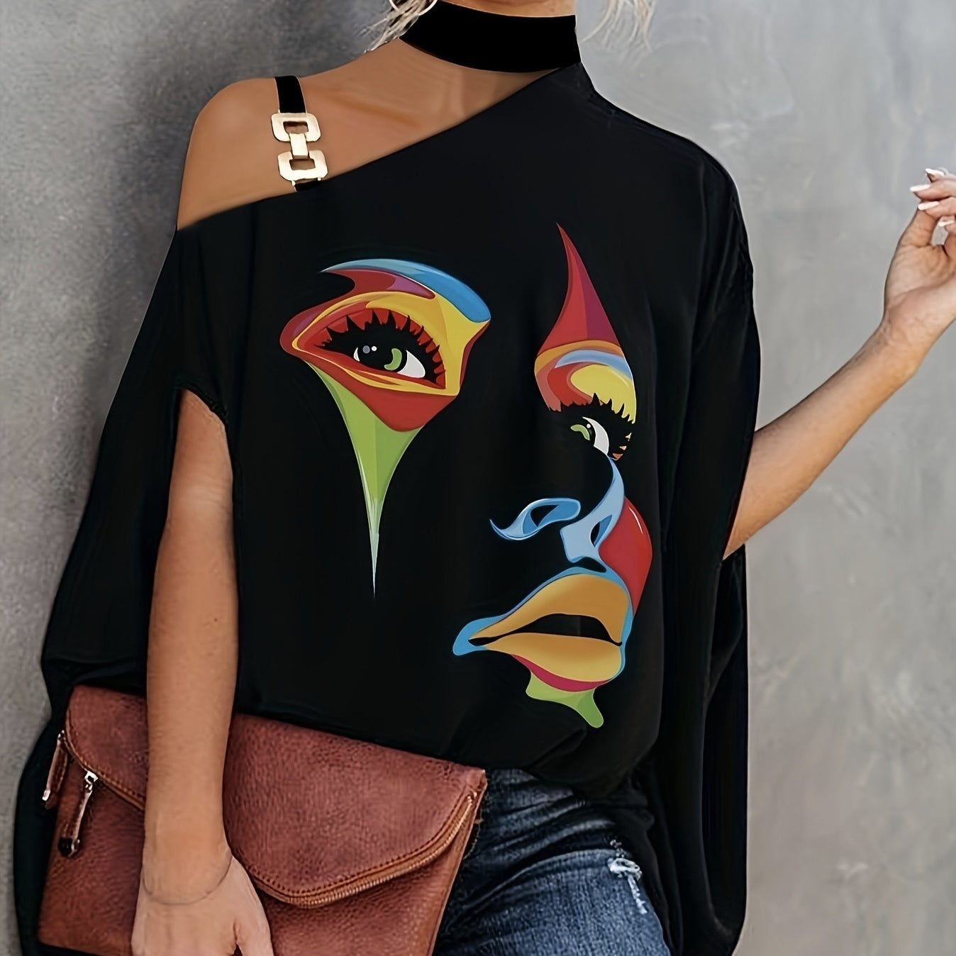 Black women's one-shoulder printed T-shirt by FitiqueFit, casualwear with stylish asymmetric design.