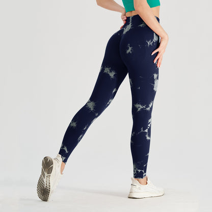Women's seamless tie-dye yoga leggings by FitiqueFit in black and blue, high-waist knitted design for comfortable active wear.