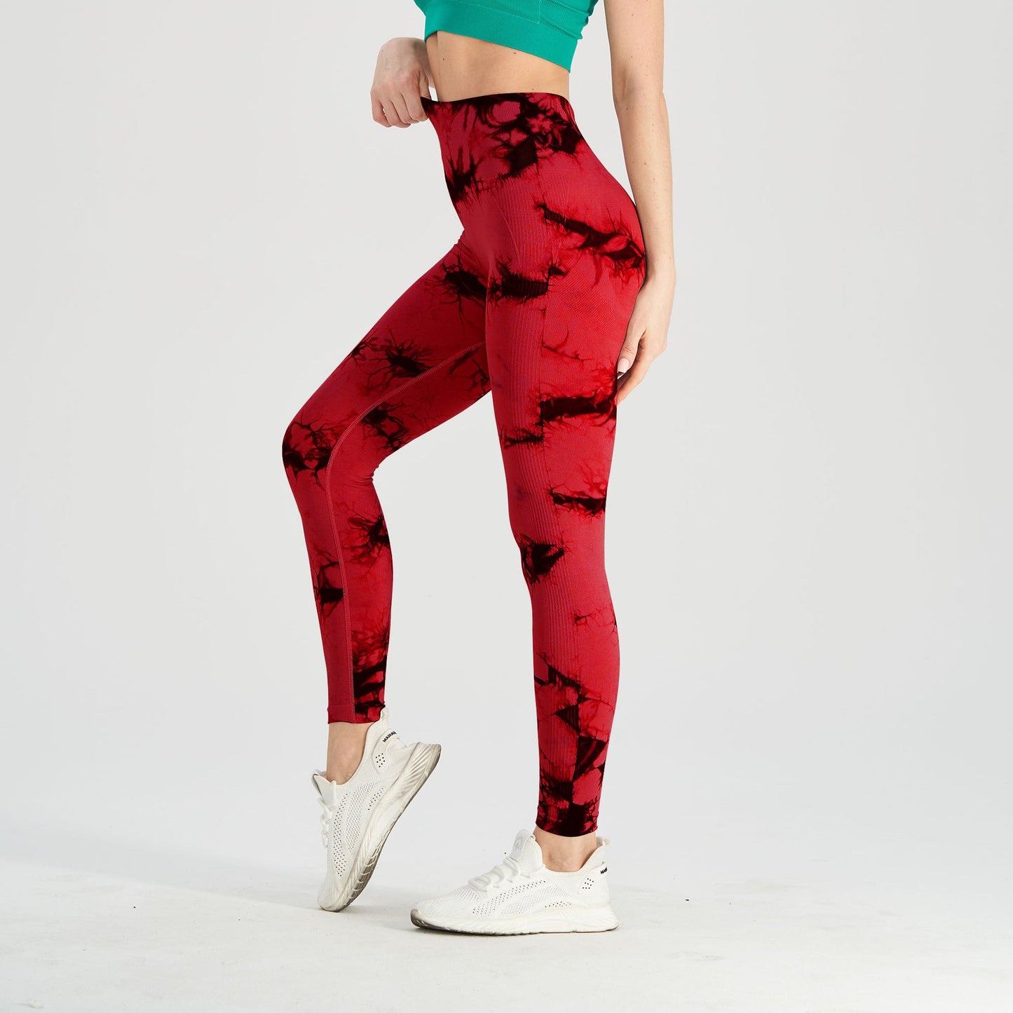 Women's seamless tie-dye yoga leggings by FitiqueFit featuring black and blue knitted high-waist design