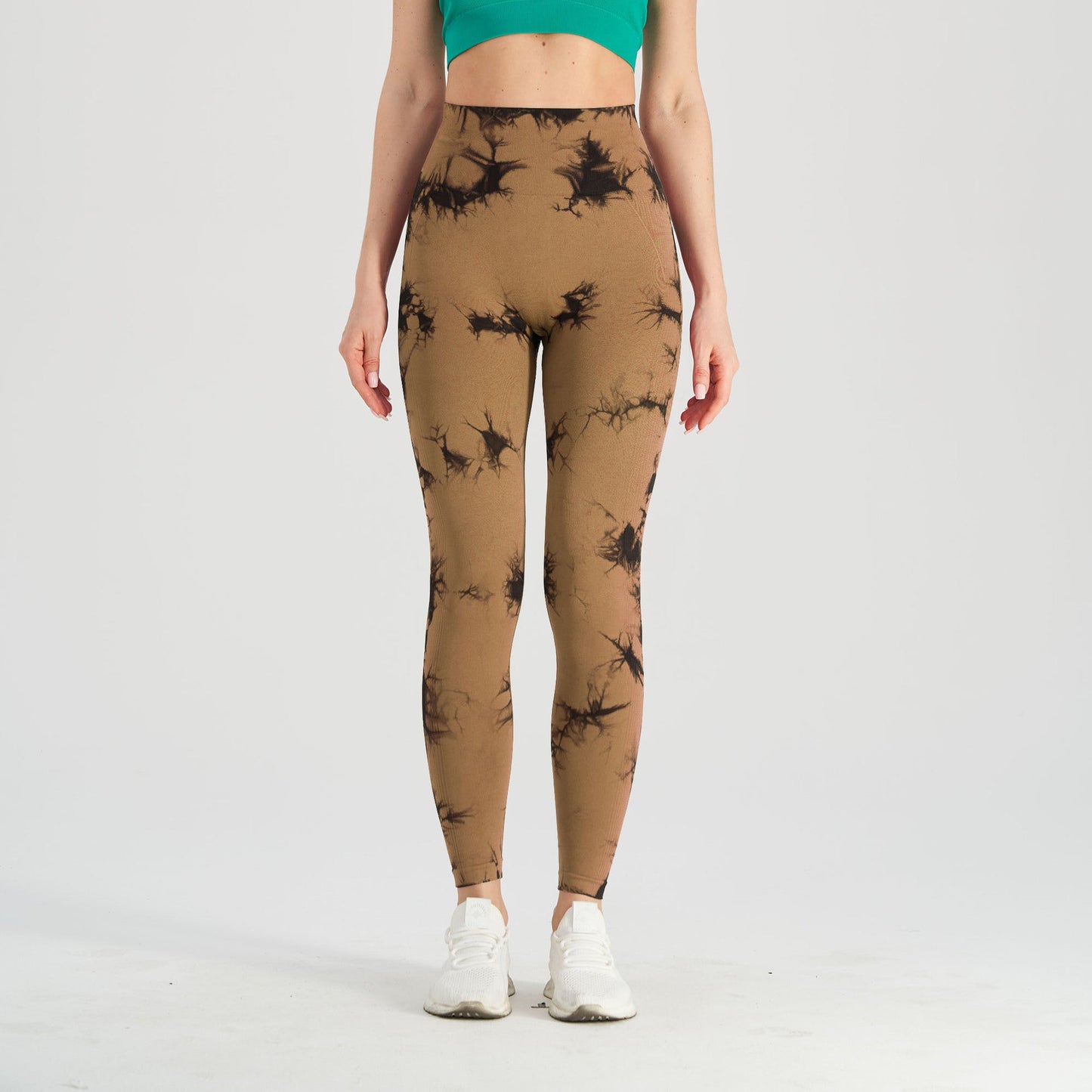 Women's seamless tie-dye yoga pants by FitiqueFit, black and blue high-waist knitted leggings for comfortable activewear.