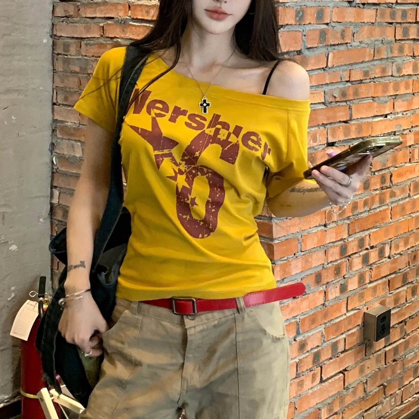 Yellow women's summer letter print T-shirt by FitiqueFit, casual streetwear with bold letter graphics on the front.