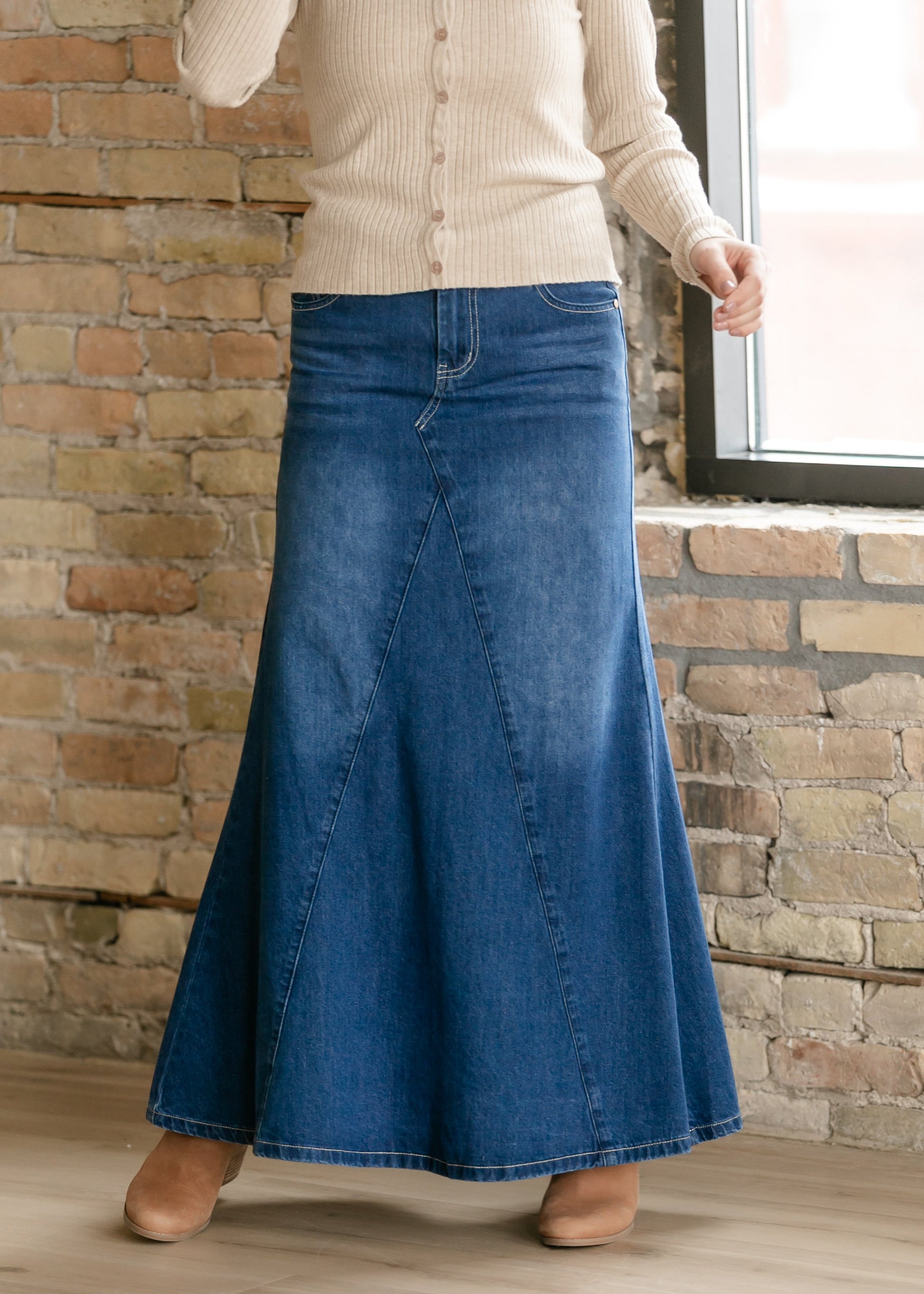 Inherit Co. Jennifer A-Line Long Denim Skirt with high waist and classic blue denim, styled for casual or chic looks.