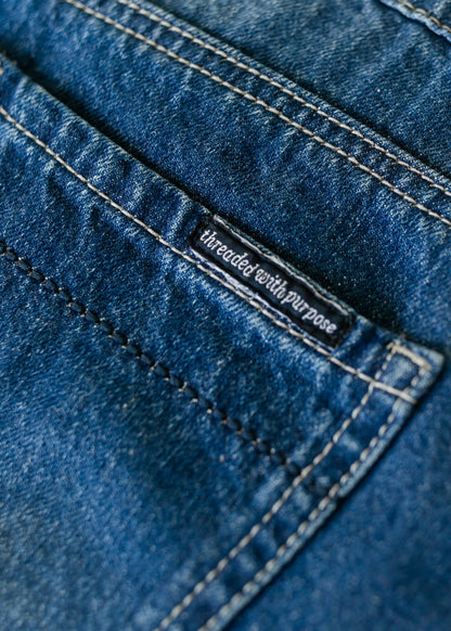 Inherit Co. Jennifer A-Line Long Denim Skirt with high waist and classic blue denim, styled with a casual top.