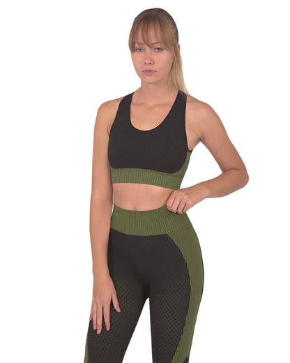Black Lazurite Trois seamless sports bra with green accents, activewear designed for comfort and support during workouts.