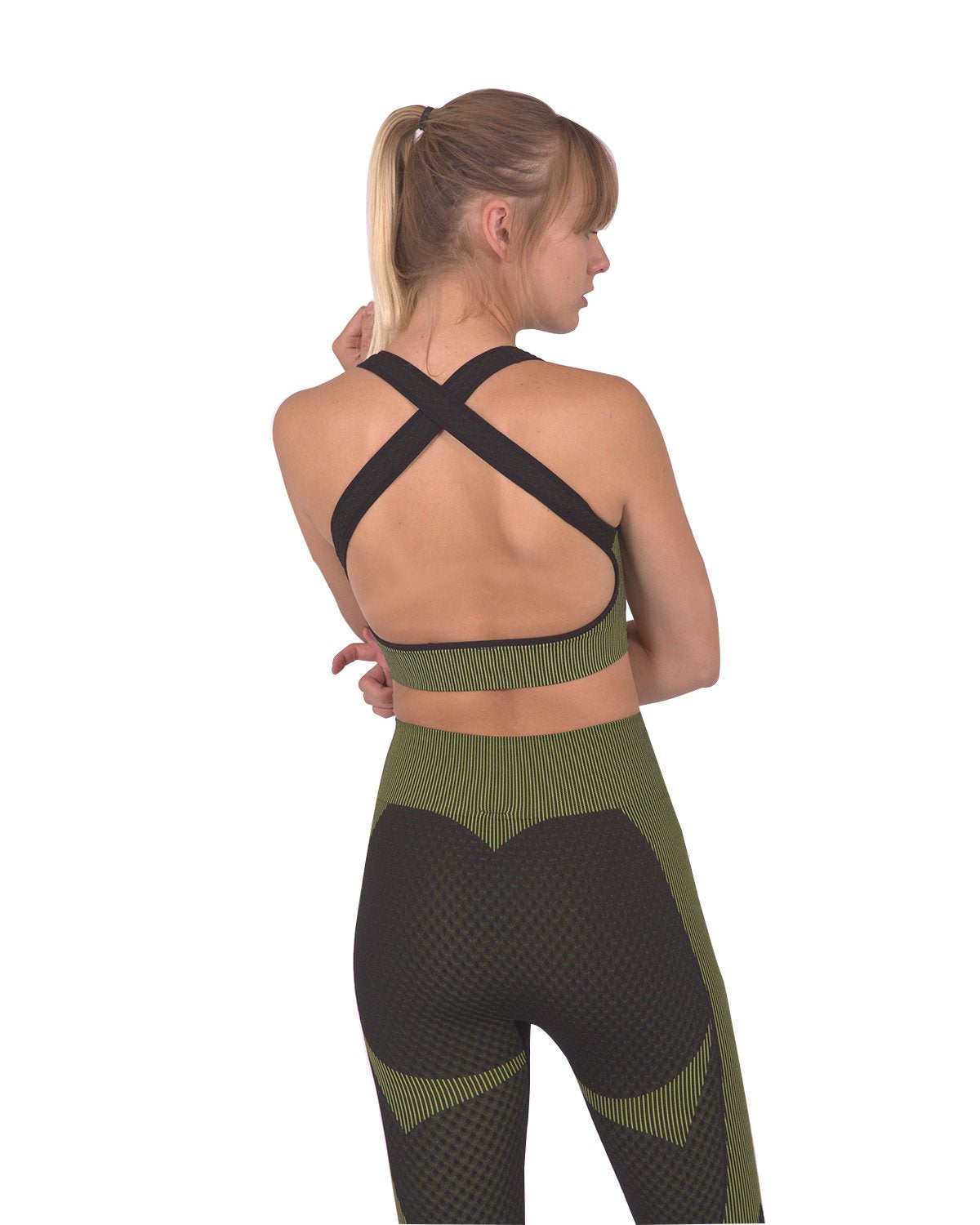 Lazurite Trois seamless sports bra in black with green accents, designed for activewear and comfortable support.