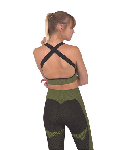 Lazurite Trois seamless sports bra in black with green accents, designed for activewear and comfortable support.