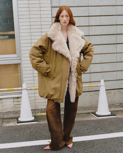 Women's Fireladyfur winter goose down coat with Tuscan wool in army green, featuring a stylish, insulated winter outerwear design.