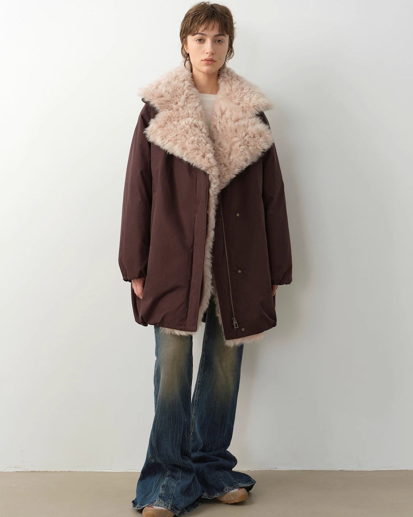Women's winter goose down coat with Tuscan wool by MINKANDFOX, featuring a warm, stylish outerwear design with plush fur accents.