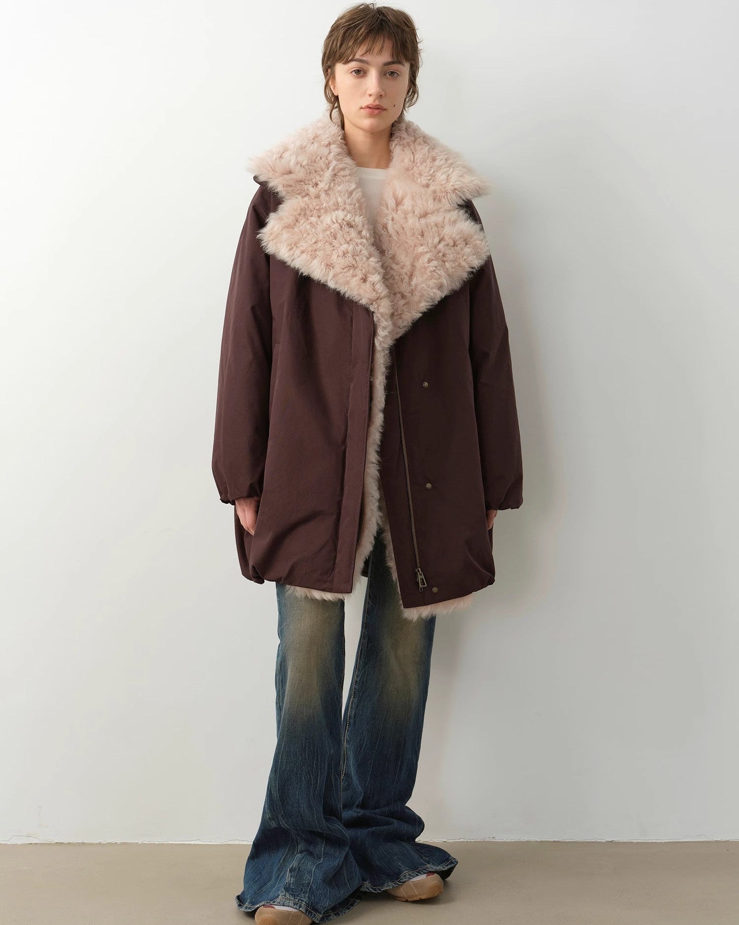 Women's winter goose down coat with Tuscan wool by MINKANDFOX, featuring a warm, stylish outerwear design with plush fur accents.