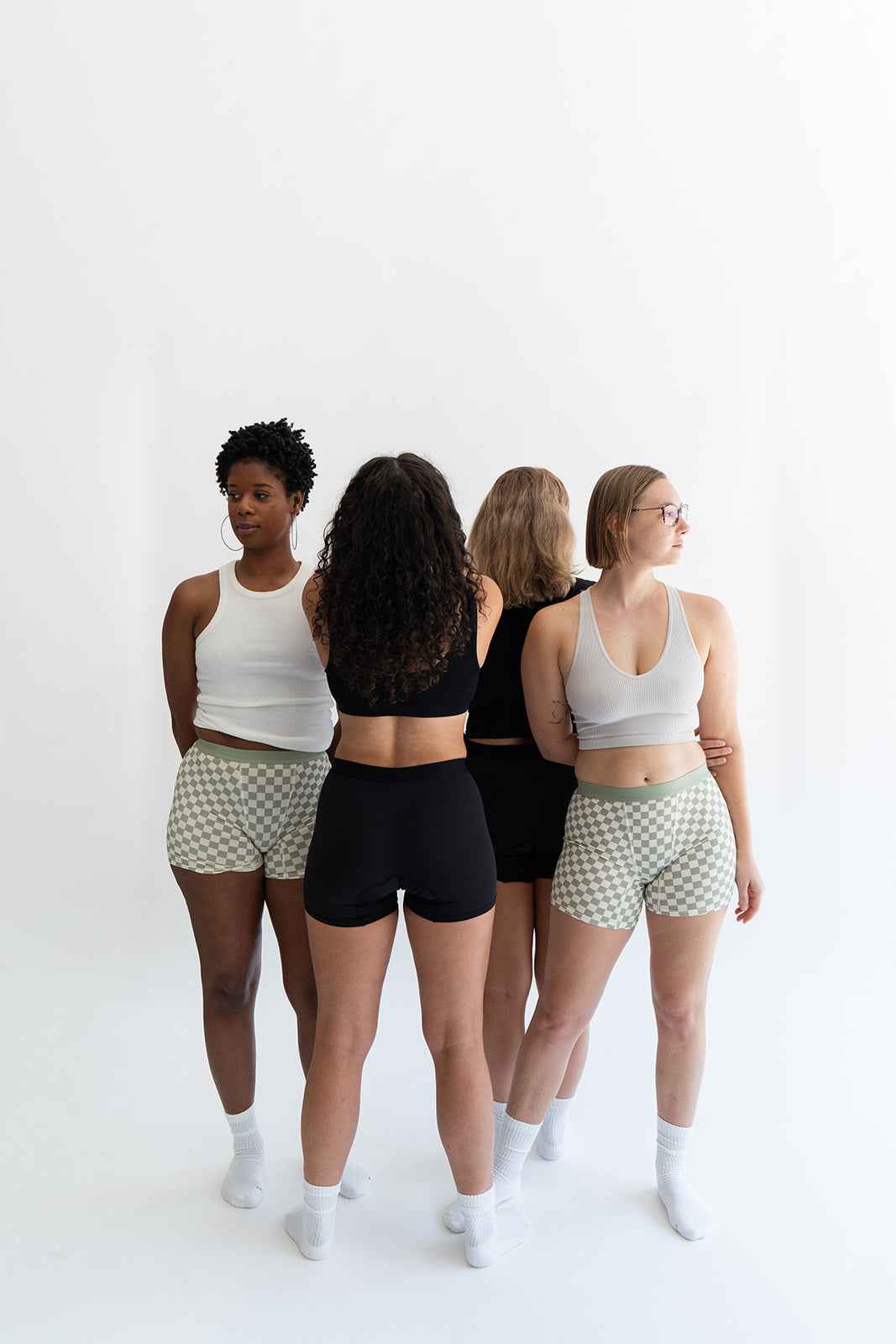 Set of black boxer briefs from Monthly’s Starter Bundle, featuring multiple pairs in XS size, displayed flat.