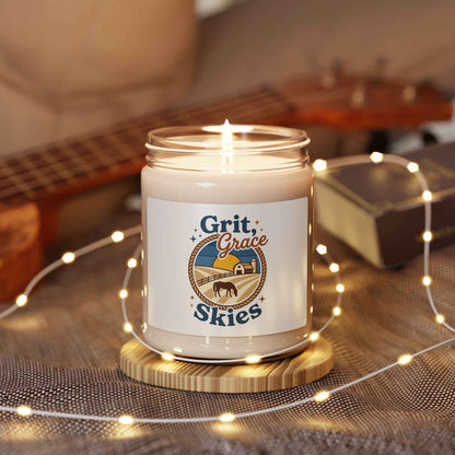 Grit + Grace Skies Soy Candle in a white jar, designed for relaxation, featuring western prairie-inspired home decor by Printify.