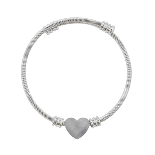 Personalized silver cuff bracelet with engraved heart design, stainless steel jewelry for women with customizable engraving.