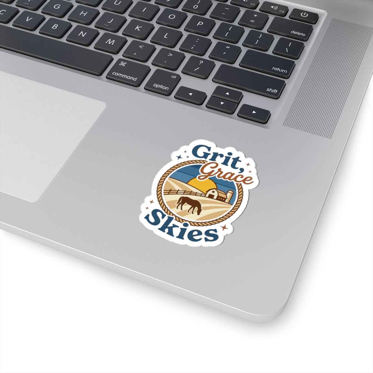 Grit & Grace Skies cowgirl ranch sticker on white paper, featuring Western-style design and vibrant country-themed artwork.