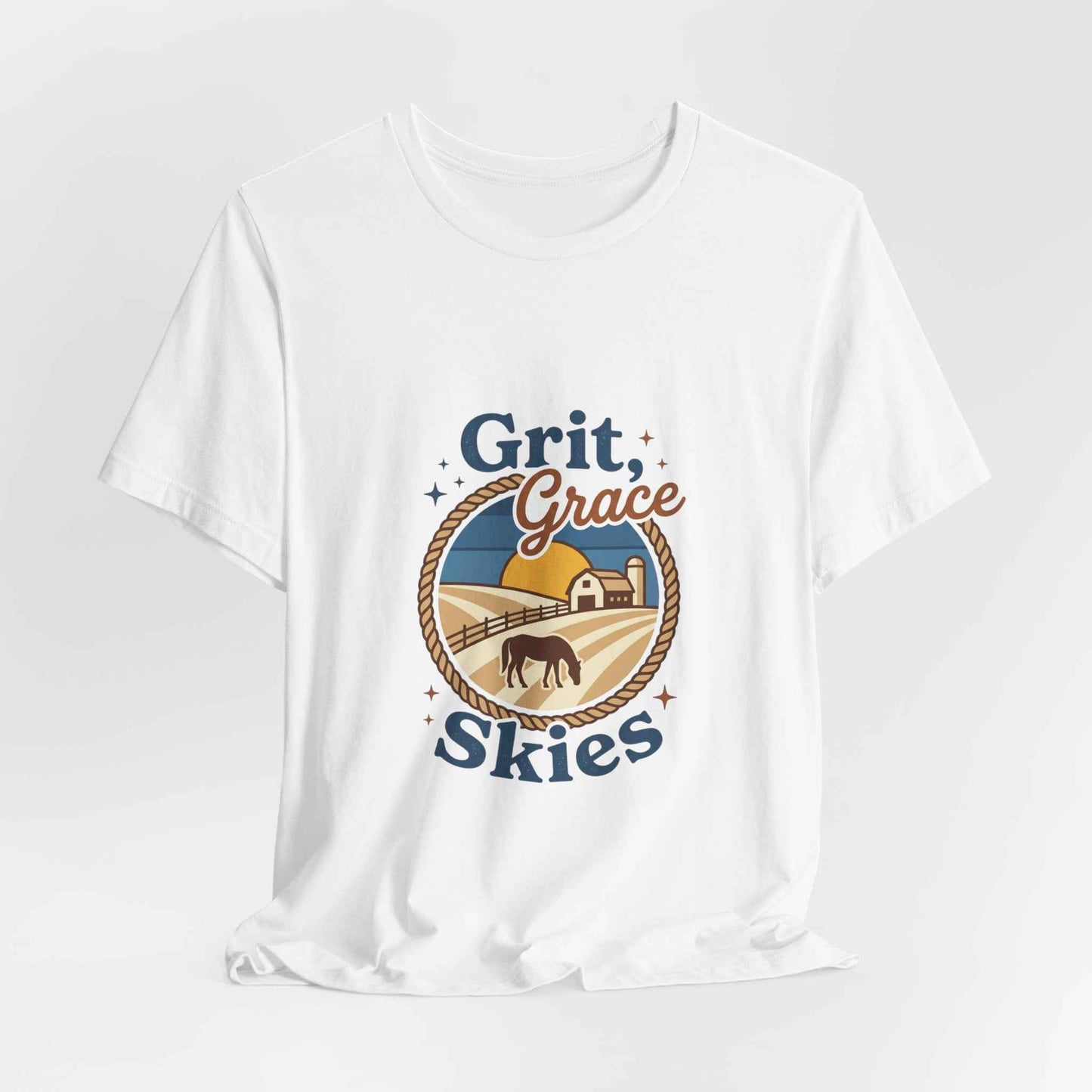 Black Grit Grace Skies T-Shirt featuring western cowgirl, ranch, rustic prairie vintage design, worn by a model standing outdoors.