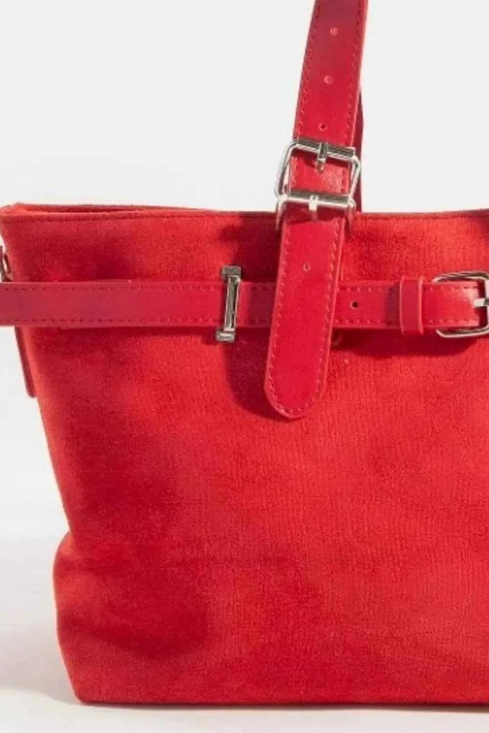 Redemption by Ashley North faux leather tote bag featuring a chic buckle detail, spacious exterior, and stylish design for everyday use.