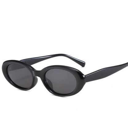 Black oval sunglasses with UV protection from Redemption by Ashley North, featuring a sleek, one-size design.