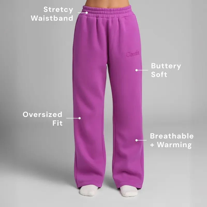 Chocolate milk-colored minimalist straight leg sweatpants by Redemption By Ashley North, shown in XS size on a model.