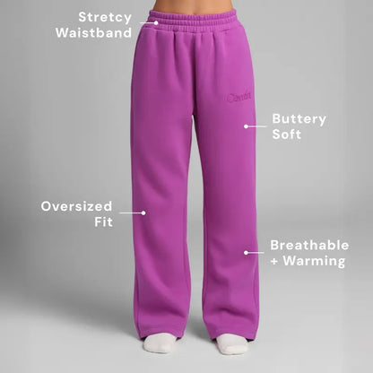 Chocolate milk-colored minimalist straight leg sweatpants by Redemption By Ashley North, shown in XS size on a model.