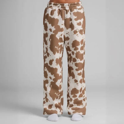 Chocolate milk-colored minimalist straight leg sweatpants by Redemption by Ashley North, shown in XS size and relaxed fit.