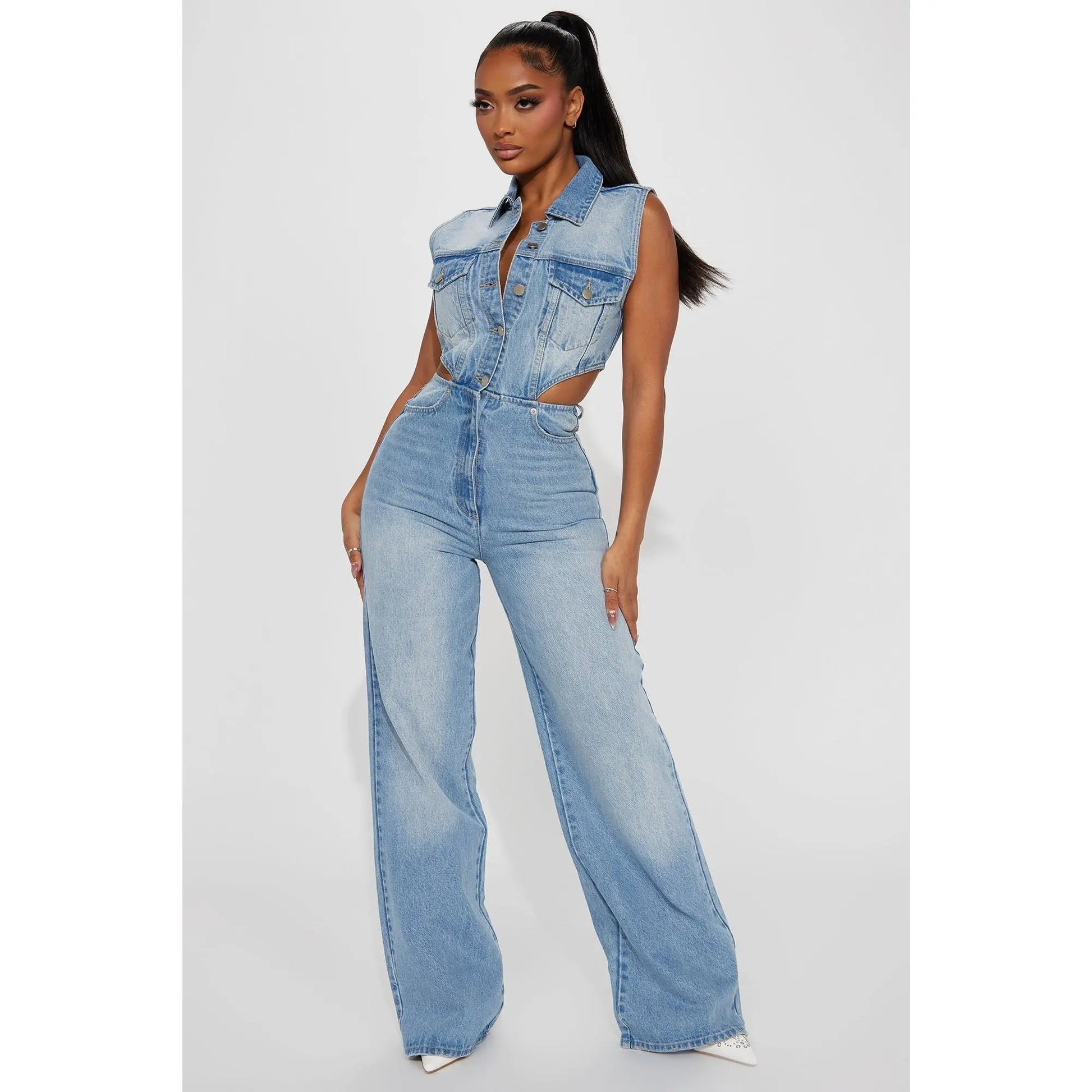 Redemption By Ashley North Baylin denim jumpsuit in light wash denim, featuring a casual fit and sleeveless design.