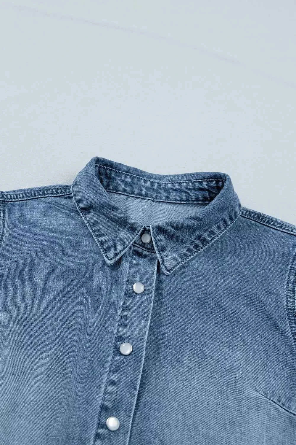 Redemption by Ashley North women's short sleeve denim shirt with frills, casual denim top for stylish everyday wear.
