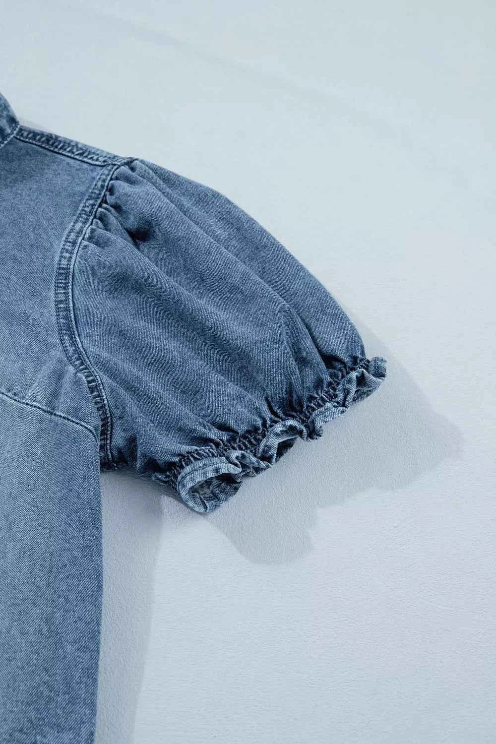 Redemption by Ashley North women's short sleeve denim shirt with frilled accents, casual stylish top for everyday wear.